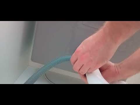 How to install a washing machine drain hose onto a barbed connector on the trap
