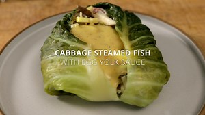 Chef Edward Lee teaches how to steam fish packets filled with vegetables and a spicy marinade. From mixing the marinade, blanching and shocking cabbage leaves, and chopping vegetables, you will gain an array of skills to make this dish and more. One of the most intriguing components is the creamy egg yolk sauce, which is a rich contrast to the light tasting fish. | YesChef