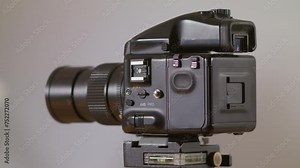 Professional photo studio and film analog camera. Roll Film Camera. Mamiya 645 Pro TL Medium Format film camera. Holder Back Magazine Cassette . Roll film back adapter dark slide shading sheet. Stock Video