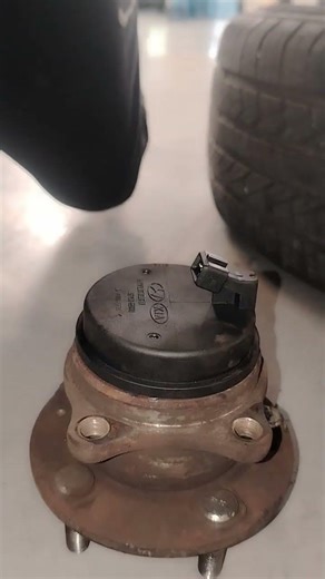 installing new wheel. speed sensor. #automobile #mechanic