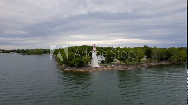 Historic Marblehead lighthouse during cloudy day at Lake Erie shore in Ohio state, USA