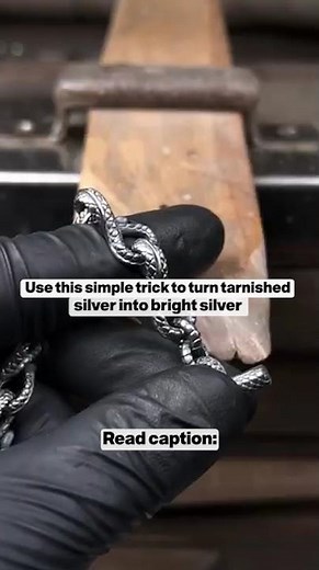 Silver tarnish happens when silver reacts with sulfur in the air and forms silver sulfide.