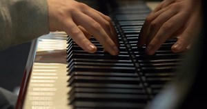 clip-15953149-young-boy-piano-player