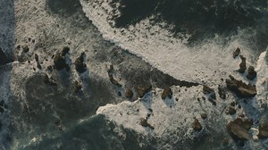 Sea waves hitting seashore rocks - Free Stock Video