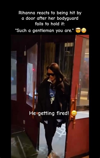 Rihanna reacts to being hit by a door after her bodyguard fails to hold it Such a gentleman you are