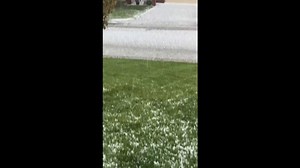 Hail stones blanket garden and trigger water flows in Wyoming