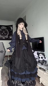 🖤💙 Dark blue tones and layered ruffles create a refined Gothic Lolita ensemble — foldover collar blouse, tiered skirt, halter neck waistcoat, and irregular-hem hooded cape come together for a dramatic yet elegant look.🦢🌑 ✨ Blouse ($65.00) — Shop here: https://www.devilinspired.com/evégie/red-black-dark-blue-gothic-lolita-foldover-collar-blouse-with-ruffle-accents.html ✨ Skirt ($77.00) — Shop here: https://www.devilinspired.com/evégie/gothic-lolita-layered-ruffle-hem-skirt-with-drawstring-des