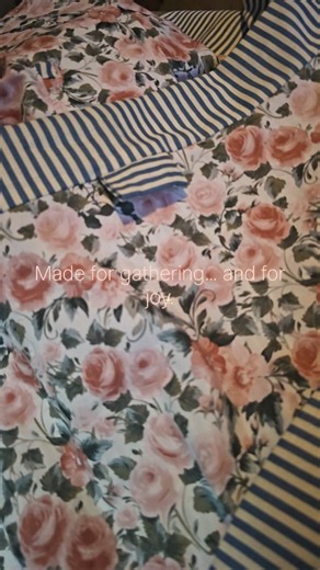 This gathering apron and matching sun hat were designed with both charm and durability in mind. The pink rose print matched with blue and creamy white stripes gives the set a vintage‑meets‑modern look that we love, while the construction is all about function. Extra stitching reinforces the spots that get the most use, and the decorative seams carry a subtle floral pattern that ties everything together. Made from 100% cotton using a blend of new and vintage materials, this set is built for real 