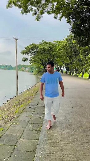 Adult Male Walking in Scenic Park Environment