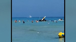 Helicopter crashes into ocean just feet from Miami Beach shore