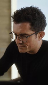 Designed by F. A. Porsche. ​Loved by Orlando Bloom.​ The Chronograph 1 – ​All Black Numbered Edition. | Porsche Design