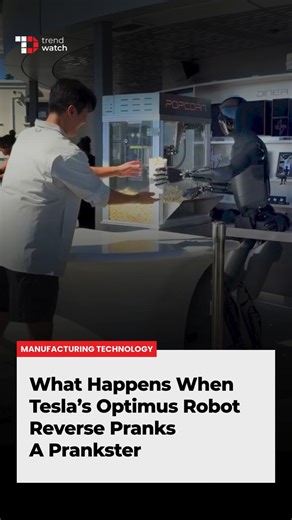 TechDogs on Instagram: "Fashion Designer Park Jaeil AKA YouTuber Korean Jay tried pulling a fast one on Tesla’s Optimus humanoid robot at the new Tesla Diner in California. At first, it looked like the bot, which was serving popcorn, was falling for it. But then… Optimus clapped back. Hard. Designed to walk, react, mimic, and interact like a human, Optimus didn’t just break the fourth wall; it played along, then flipped the script. Funny or freaky? A prank war between man and machine might not b