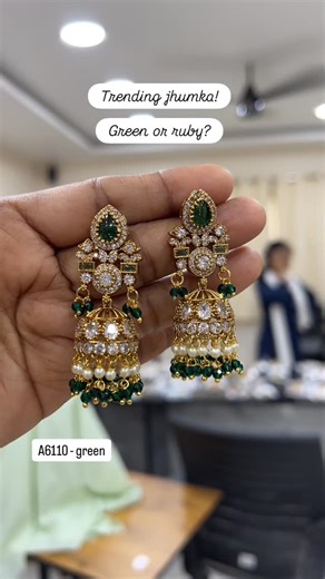 Amora Arts and Jewels on Instagram: "Trending crystal bead hanging jhumka! Product code: A6110-Green, A6108-Ruby #amoraartsandjewels"