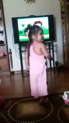 My daughters doing the mambo with Dora the explora