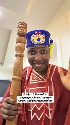 Discover the Sacred Ori Olókun Wooden Staff