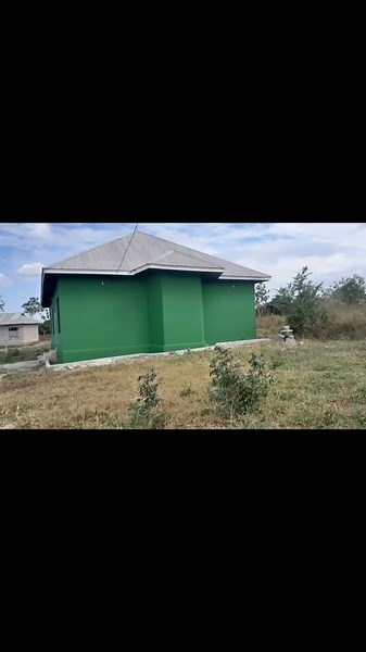 Exploring a Green-Painted Building Interior and Exterior