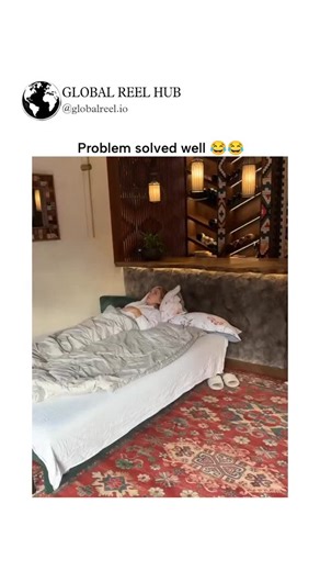 GLOBAL REEL HUB™ on Instagram: "Dm for Credit / Removal This viral video captures a tattooed man playfully stealing the bedsheet from his partner and improvising with a floor cushion to cover his legs, humorously addressing the common "blanket hog" dilemma in relationships. Posted January 2, 2026, by South African creator @tmanzii_ —typically focused on wildlife adventures—the clip amassed 2.6 million views and 22,000 likes in under 24 hours, highlighting its broad appeal in everyday comedy. Use