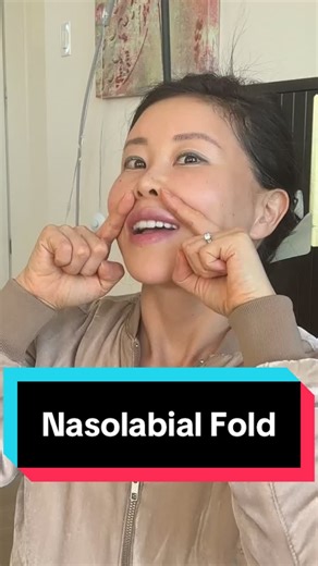 To reduce smile lines quickly, work from the inside out. Place the tip of your tongue at the origin of the nasolabial line, not the middle. Press gently and repeat on both sides. If your hands are free, add a light sandwich: tongue inside, fingers outside. Or pinch the cheek fat (not the skin) to release tension. This gives short-term improvement, but doing it regularly helps keep the area smooth. Reset the lines right after laughing. It’s like skin ironing. #KokoHayashi #KokoFaceYoga #FaceYoga 