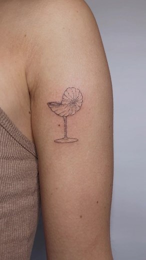 Elegant Shelltini Tattoo Designs for Ocean Lovers