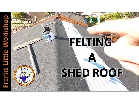 Felting a shed roof.