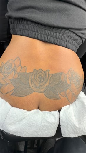 Laron Perkins on Instagram: "She came all the way from Detroit for this lower back tattoo makeover…. IDK WHAT WAS GOING ON WITH THAT TATTOO THAT WAS IN THE MIDDLE OF HER BACK 😂😂😂❤️❤️❤️ Big Pressure was applied tho"