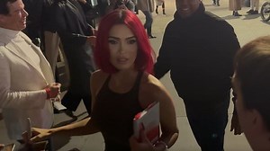 Megan Fox goes braless under a sheer brown tank top while out in NYC