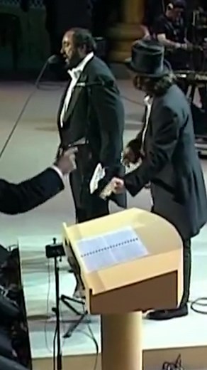 Luciano Pavarotti and Zucchero Performing Va Pensiero at Pavarotti and Friends Concert 1998