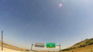 4K Driving on Highway/interstate, Exit sign of the Kansas City, Missouri