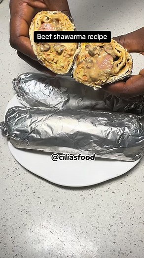 Easy way for you to make your shawarma at home and enjoy . Ingredients are: . 1.beef 2.carrot 3.cabbage 4.sausage 5.bama 6.sweet chilli pepper 7.evaporated milk 8.ketchup 9.condensed milk 10.Cameroon pepper 11.lemon juice 12.shawarma bread . To marinate beef: 1.chilli pepper 2.paprika 3.garlic paste 4.onion 5.season cube/salt . . #shawarma #beefshawarma #shawarmarecipe #shawarmalovers #fyp