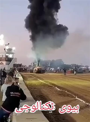 Red Tractor Burnout on Dirt Track: Thrilling Outdoor Event