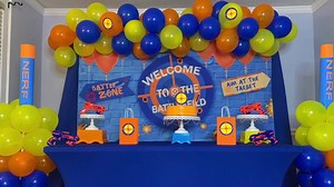 14K views · 42 reactions | How to throw a Nerf Birthday Party! now this is how you throw a Nerf party easy and inexpensive to do in this video I show you how to make a party using dollar tree item Backdrop:https://amzn.to/32tomsk Table cloth:https://amzn.to/31siVdR Guns:https://amzn.to/31vNG1n balloon stand:https://bit.ly/3aZGgGK backdrop stand :https://bit.ly/3aZGgGK balloon strip:https://bit.ly/3hsPaz4 | Special Creations By Nelly | Facebook