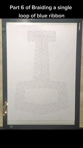 Braiding a single loop of blue ribbon into the shape of Thor's Hammer, Part 6 #draw #norway #norge #art #norsepagan #norse #mjollnir