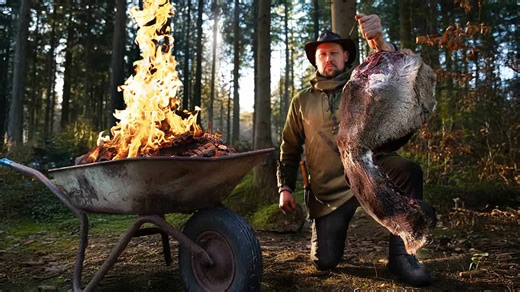 Pure FireKitchen in action: Cooking venison in a burning wheelbarrow