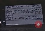 May 12, 1966 – Vietnam: Men of U.S. 377th Air Police Security Squadron and their dogs arrive for patrol at Tan Son Nhut Air Base in Vietnam.
