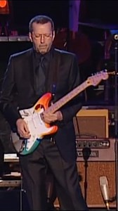 On this day in 2002: the Party at the Palace, a concert in celebration of Queen Elizabeth II’s Golden Jubilee, was filmed and recorded at Buckingham Palace. Paul McCartney joined Eric for a performance of "While My Guitar Gently Weeps" as part of the show. | Eric Clapton