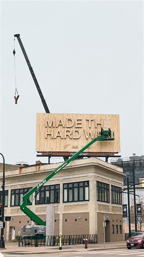 Red Wing Work on Instagram: "Made the Hard Way — Behind the scenes installing an 18’ x 40’ wood billboard. Installed by Chris, Nate, Migual, Mike and Dustin"