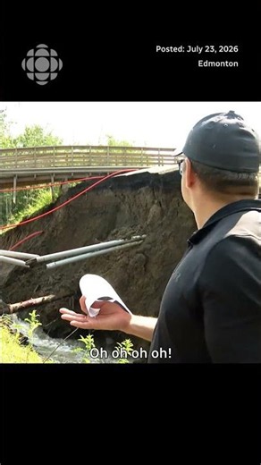 Watch as northwest Edmonton road partially collapses mid-interview
