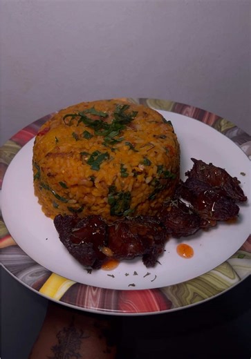 New Year's Eve Dinner Featuring Jollof Rice, Beans and Plantain
