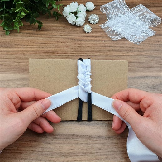 385K views · 2.6K reactions | Awesome Look what I did with two hair elastics and a white ribbon! | DIY Vakti | Facebook