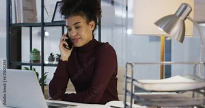 Business, phone call and woman with anger, laptop and anxiety in a modern office, upset and communication. Female person, angry employee or agent with a smartphone, connection and network with stress
