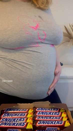 Stuffy Bunny on Instagram: "Chocolate Bar Belly Stuffing #biggirl #chunky #weightgain #foodbaby"