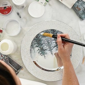 1.8M views · 42K reactions | Grab one of these silver chargers from the dollar or thrift store and make a beautiful piece of decor for the holidays and beyond. #crafts #thriftflip #dollartreediy #decoupage | Sustain My Craft Habit | Facebook