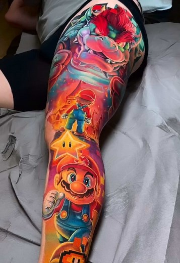 Super Mario 🐢💥Boss battle unlocked 🐢tattoo for Alex — pixels vs power 🎮 thanks for making the trip north man !! #SuperMarioTattoo #BowserTattoo #PixelMario #LegSleeveTattoo #GamingTattoo