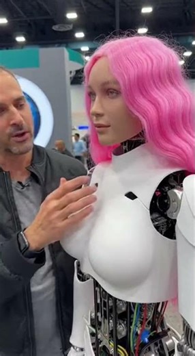 Stunning Pink-Haired Humanoid Robot at Tech Expo Unveiling #robotics #AI #innovation