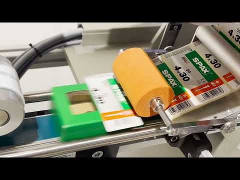 High speed seal labelling of carton from above