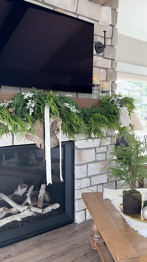 Interior Delights on Instagram: "Green zip ties and the 48” Cyprus Norfolk garland for the win . A few TIPS:🎄After much fiddling I went straight for the zip ties & that was a game changer . I laid all five garlands out on the ground & overlapped them about 12” on each side. I made sure to tighten them right at the loop & really tuck the loops under the garland so they don’t pop out. I attached the bells directly to the mantel with a zip tie so they would lay nicely & not fall off . I also used 