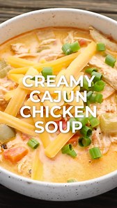 This Creamy Cajun Chicken Soup is loaded with tender chicken, peppers, onions, celery and cajun spices! You can enjoy a large serving of this cheesy keto soup recipe for only 8 net carbs! https://www.maebells.com/creamy-cajun-chicken-soup/ | The Best Keto and Low Carb Recipes