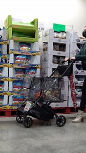 8.4K views · 16 reactions | Rainy day errands, but still rolling. ☔️ Out in the rain with the Boot shopping cart, hands free, and zero bags digging into my arms. Because life doesn’t pause for weather — and neither do we. Messy hair, wet sidewalks, still getting it done. ✨ #joovy #shoppingcart #boot | joovy | Facebook