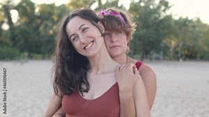 Two girls hug, lesbian couple spends time together, equality, tenderness in the relationship of two women, lgbt, portrait of two girls