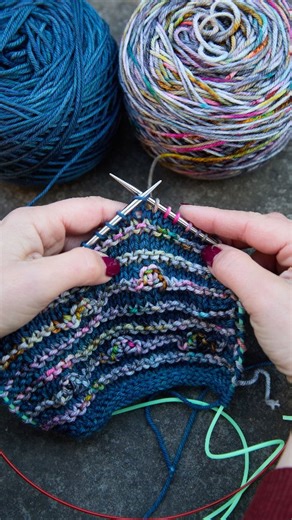 19K views · 596 reactions | Here's how I work the "bush" stitch in my Into The Hoods Mystery Knit-a-long two-color option! She's FUN! (Full instructions are in the pattern and in the 1st clue video on my YT channel!) The pattern with all 6 hood options is available until November 19th, when the final clue drops! #intothehoodsmkal #intothehoods #nelkindesigns | Laura Nelkin Designs | Facebook